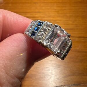 925 sterling silver ring size 7 1/2 with blue sapphires and clear stones